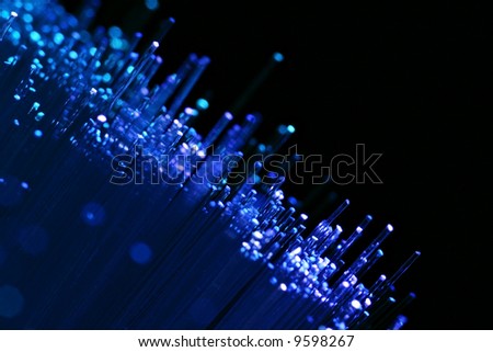 Fiber optics background with lots of blue light spots