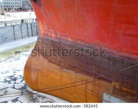 Prow of ship in the icy St Lawrence river, Quebec, Canada