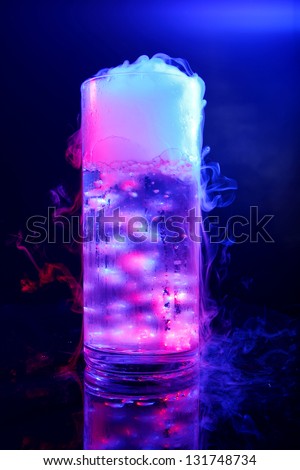 drink in glass with the effect of dry ice