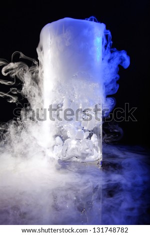 drink in glass with the effect of dry ice