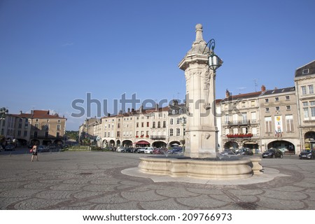 PONT-A-MOUSSON, FRANCE, 1 AUGUST 2014: fountain and square in the french town of Pont a Mousson