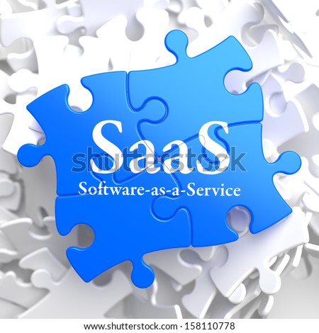 SAAS - Software-as-a-Service - Written on Blue Puzzle Pieces. Information Technology Concept. 3D Render.