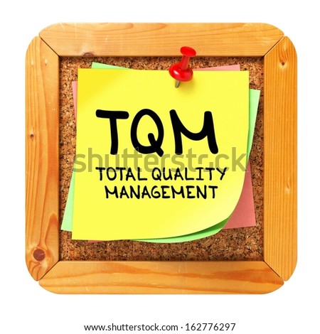TQM -  Total Quality Management - Written on Yellow Sticker on Cork Bulletin or Message Board. Business Concept.