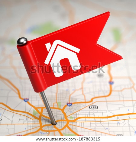 Red Small Flag with House Icon on a Map Background with Selective Focus.