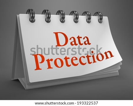 Data Protection - Red Words on White Desktop Calendar Isolated on Gray Background.