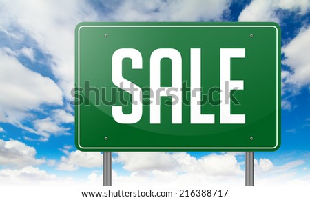 Highway Signpost with Sale wording on Sky Background,