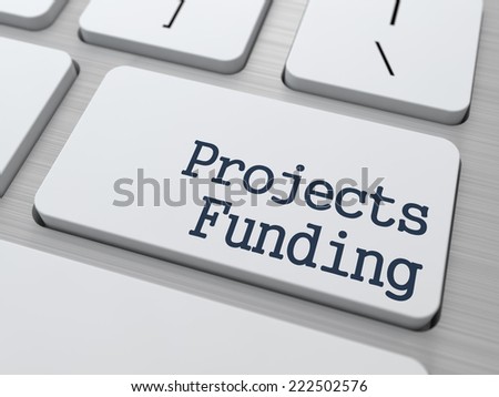 Projects Funding Concept. Button on Modern White Computer Keyboard.