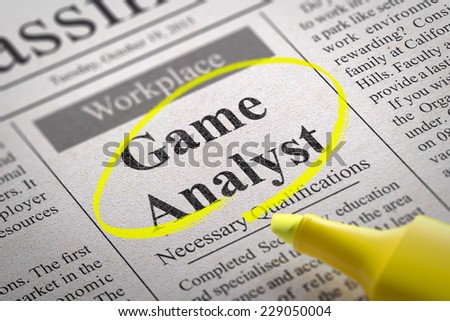 Game Analyst Vacancy in Newspaper. Job Seeking Concept.