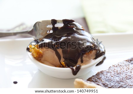 Caramel and honeycomb ice cream with melted chocolate sauce.