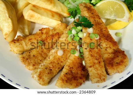 Crumbed fish and chips ready to eat.