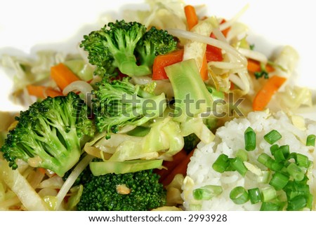 Steaming hot stirfry vegetables straight from the wok.