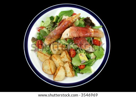 Chicken tenderloins wrapped in prosciutto with oven roasted chat potatoes and a garden salad.