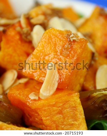 Roasted pumpkin and onion salad with wilted spinach and toasted almonds.