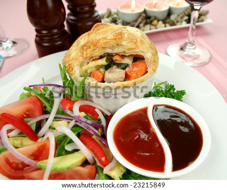 Homestyle chicken and vegetable pie with salad