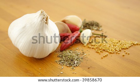 Garlic with chillies, oregano, mustard seeds and basil.