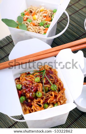 stock-photo-bbq-egg-noodles-and-vegetable-noodles-in-take-away-containers-53322862.jpg
