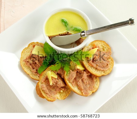 Delicious homestyle country pate with toasted crisps ready to serve.