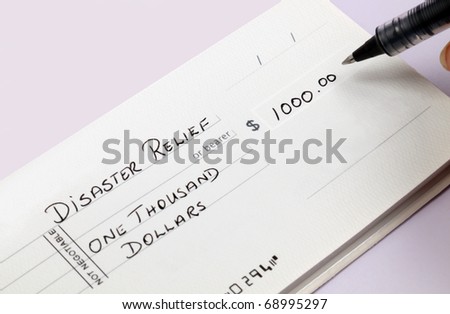 A disaster relief check being written for one thousand dollars.