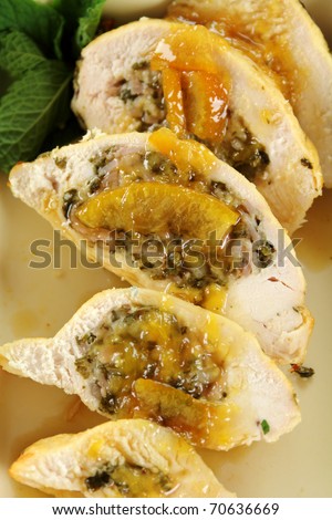 Delicious sliced stuffed chicken with a piquant sauce ready to serve.