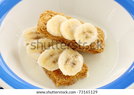 Iconic Australian breakfast cereal Weet Bix served with sliced banana.