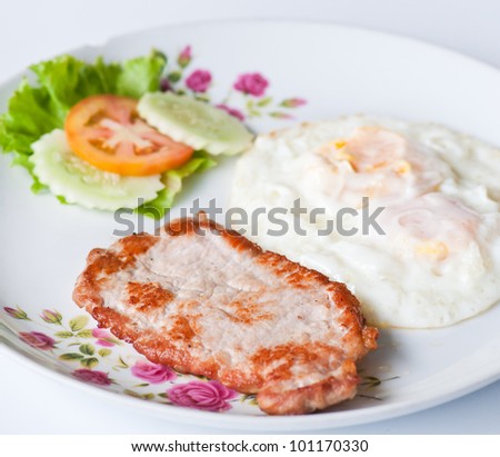 pork steak with fried eggs, breakfast