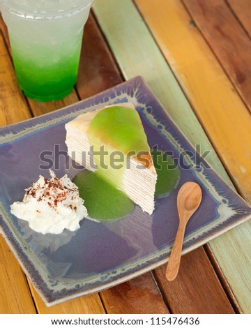 crape cake with green apple sauce and whipped cream, homemade style