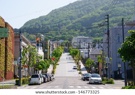HAKODATE - June 4 : View of the road to the mountain in Hakodate, Japan on June 4, 2013. Hakodate was Japan\'s first city whose port was opened to foreign trade in 1854.