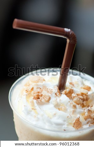 macro shot of ice coffee with beans