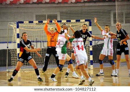 MINSK, BELARUS - MAY 30: Unidentified handball players (Belarus) in attack during European Championship qualifying match (Belarus  Germany) on May 30, 2012 in Minsk, Belarus.