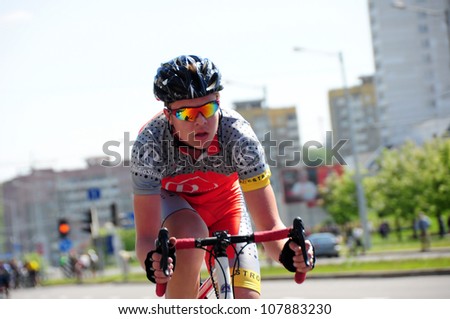 MINSK, BELARUS - MAY-19: Unidentified sportsmen competes in 15 km cycling race during NATIONAL DAY of SPORT on May 19, 2012 in Minsk, Belarus.