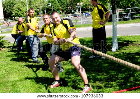 MINSK, BELARUS - MAY 19: Unidentified sportsmen compete in tug of war during NATIONAL DAY of SPORT on May 19, 2012 in Minsk, Belarus.