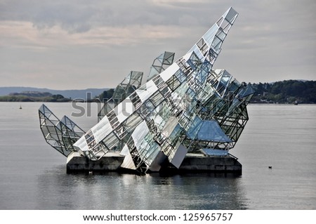 OSLO, NORWAY - AUGUST 16: She Lies, a sculpture constructed of stainless steel and glass panels by Monica Vonvicini on August 16, 2012 in Oslo, Norway.