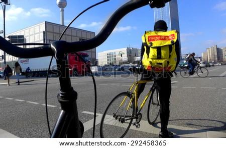 BERLIN MARCH 6: Unidentified male on the bicycle (over 15% people in Berlin prefer moving by bike) on March 6, 2015.