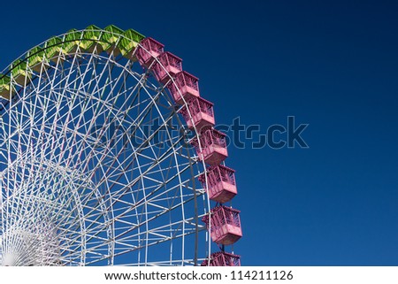 ferris wheel isolated on blue, working in the fair of Albacete