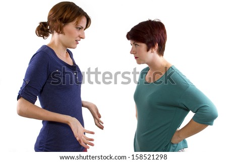 two Caucasian women arguing and distrusting each other