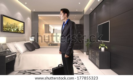 young caucasian businessman travelling with luggage or baggage in a hotel