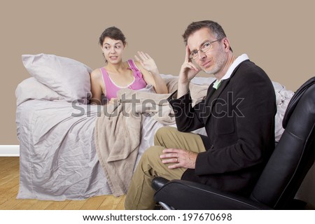 father scolding lazy daughter who wont get out of bed
