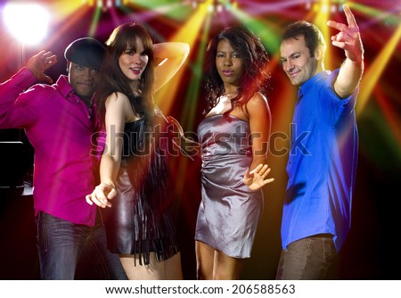 fashionable young male and female adults club dancing