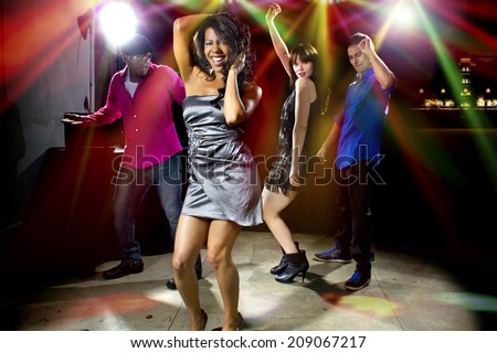 cool people dancing in a nightclub or bar lounge