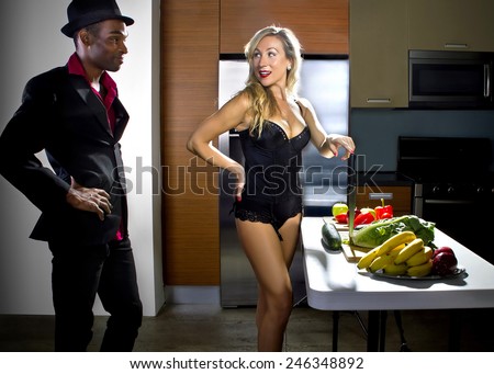 female welcoming spouse home with a sexy dinner date