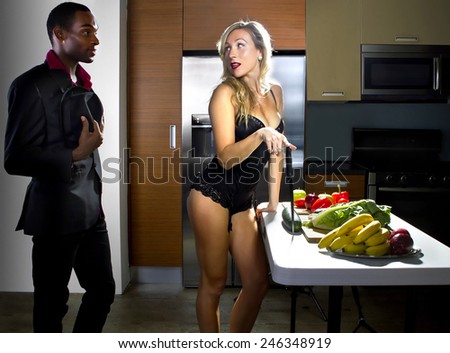 female welcoming spouse home with a sexy dinner date