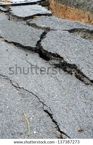 layer of broken asphalt road at rural areas.