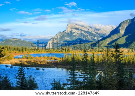 The Canadian Rockies have numerous high peaks and ranges, such as Mount Robson 3,954 m  and Mount Columbia 3,747 m . The Canadian Rockies are composed of shale and limestone.