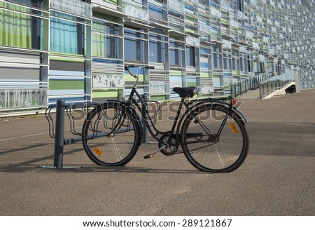 KOTKA, FINLAND - AUGUST 17, 2013: Old forgotten bike in the Parking lot at the Maritime center \