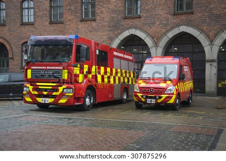 COPENHAGEN, DENMARK - NOVEMBER 01, 2014: Two fire trucks in front of the fire control service in Copenhagen