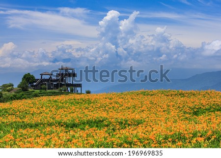 A viewing platform looking towards a mountain range.