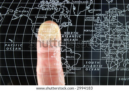 Single finger on world map pointing at the USA with Fingerprint overlay
