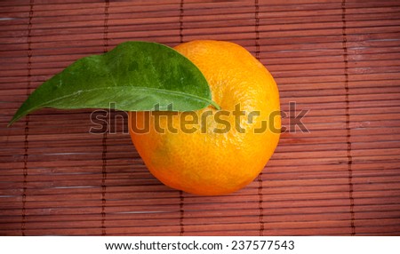 are beautiful ripe tangerine I was it is photographed in a photographic studio