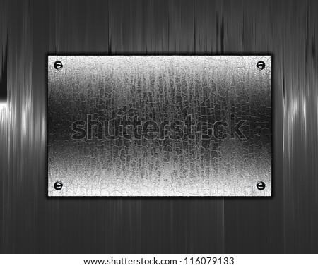 The template for the inscription. Beautiful metal background with a metal nameplate for writing.