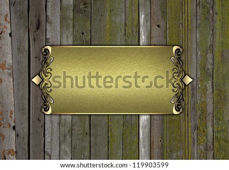 Template for writing. Wooden background with gold name plate with gold ornate edges